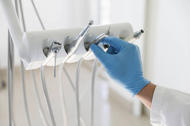Professional Tooth Extraction technician working in Pearl Beach, MI